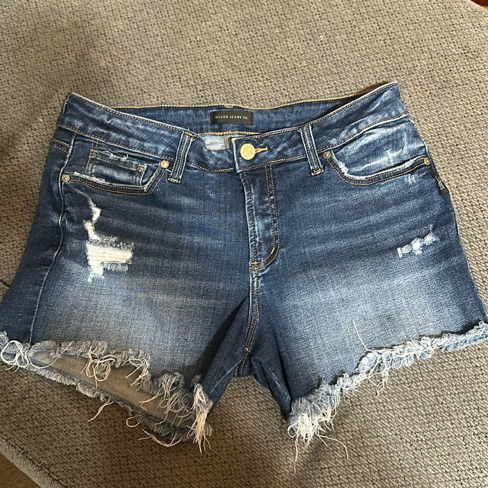 Silver denim distressed shorts